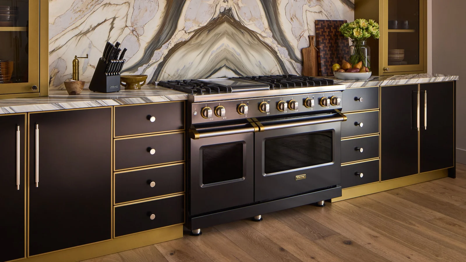 Viking onyx and brass professional range installed in a custom kitchen